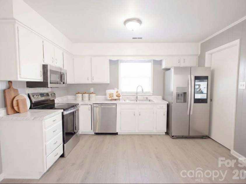 2220 Gaines Avenue, Gastonia, NC 28054.  MLS# CAR4336919, YatesRealty ID 21925. Kitchen virtually staged