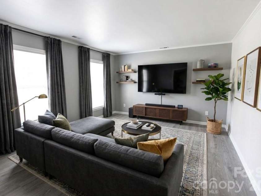 2220 Gaines Avenue, Gastonia, NC 28054.  MLS# CAR4336919, YatesRealty ID 21925. Living room virtually staged