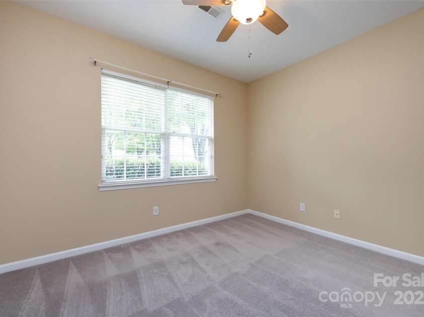 1040 Stonedown Lane, Matthews, NC 28104.  MLS# CAR4271671, YatesRealty ID 21926. Front Guest Room