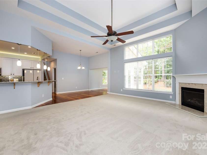 1040 Stonedown Lane, Matthews, NC 28104.  MLS# CAR4271671, YatesRealty ID 21926. Great Room with Soaring Windows