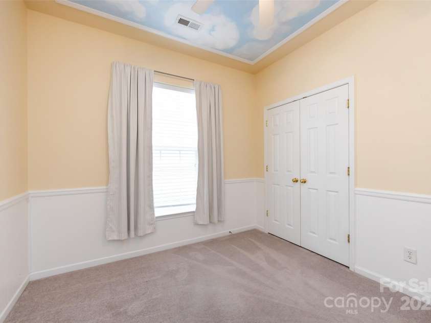 1040 Stonedown Lane, Matthews, NC 28104.  MLS# CAR4271671, YatesRealty ID 21926. Middle Guest Room