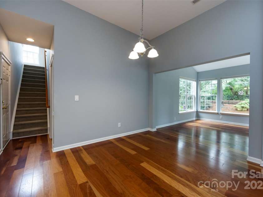1040 Stonedown Lane, Matthews, NC 28104.  MLS# CAR4271671, YatesRealty ID 21926. View of garage door to the left, breakfast area, sunroom and loft (F.R.O.G)