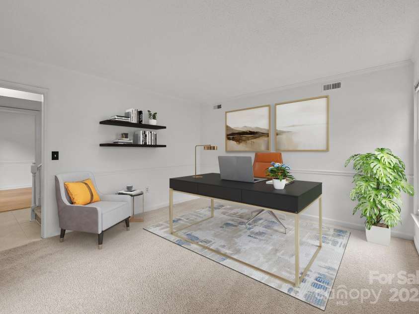 906 Wishing Well Lane, Charlotte, NC 28270.  MLS# CAR4269640, YatesRealty ID 21928. Flexible front living room that can easily be transformed into a home office or playroom (virtually staged)