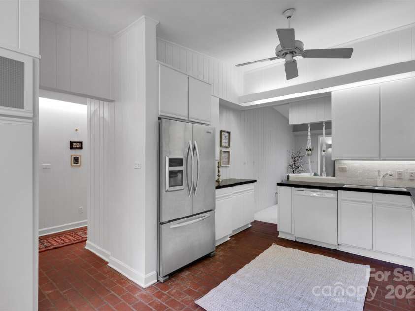 331 Glen Oaks Road, Charlotte, NC 28270.  MLS# CAR4260350, YatesRealty ID 21929. Kitchen cabinets have convenient slider shelves - so go ahead and load those cabinets up!