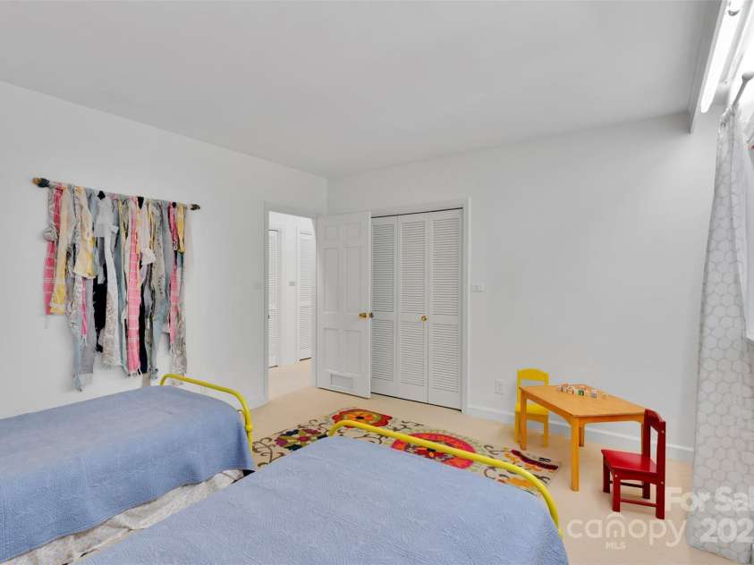 331 Glen Oaks Road, Charlotte, NC 28270.  MLS# CAR4260350, YatesRealty ID 21929. Plenty of closet space - practically the length of the hallway leading to the guest bedrooms