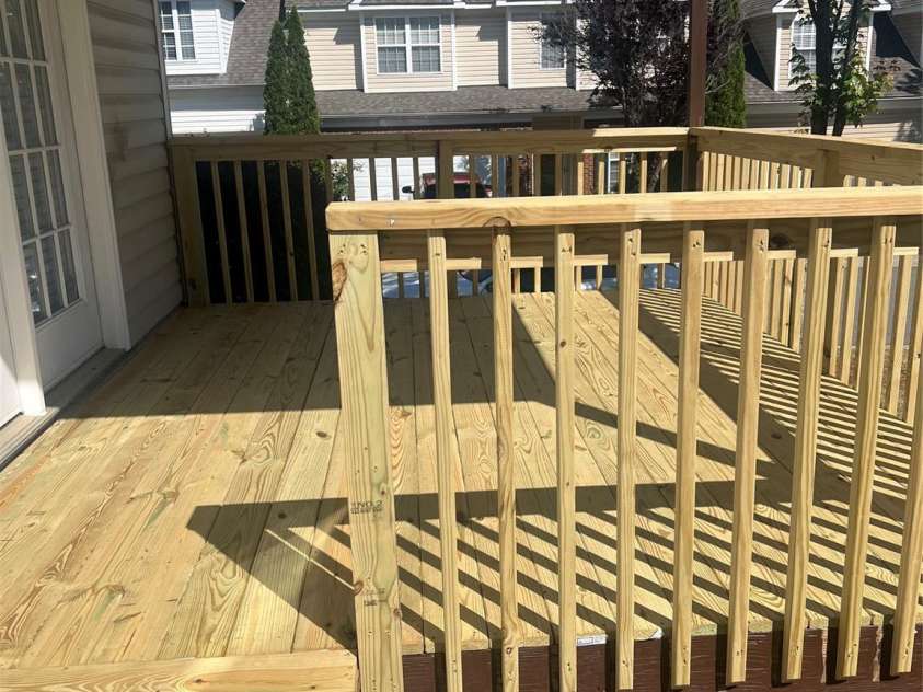 10932 Stone Trail Road, Charlotte, NC 28213.  MLS# CAR4371875, YatesRealty ID 21935. Rebuilt Covered Deck