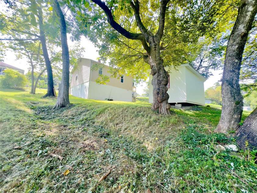 329 Morehead Road, Marion, NC 28752.  MLS# CAR4291357, YatesRealty ID 2194. Back yard