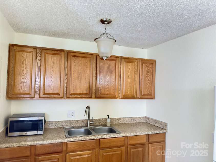 329 Morehead Road, Marion, NC 28752.  MLS# CAR4291357, YatesRealty ID 2194. Kitchen cabinets
