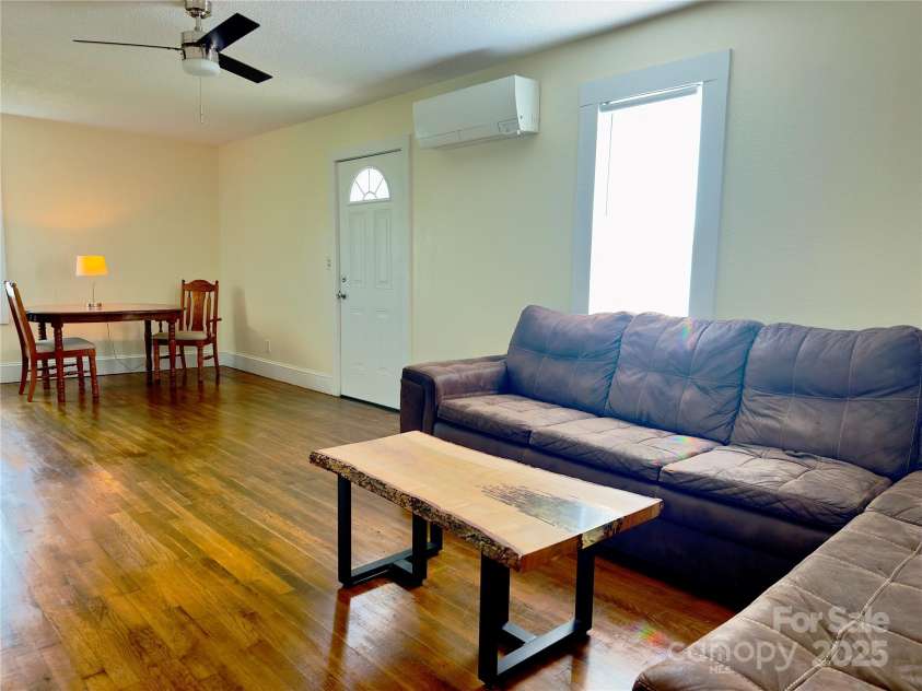 329 Morehead Road, Marion, NC 28752.  MLS# CAR4291357, YatesRealty ID 2194. View from living area to dining area.  Great flow and open concept