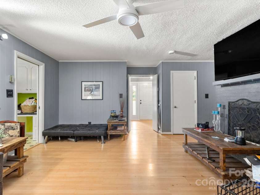 1210 Brookwood Drive, Shelby, NC 28150.  MLS# CAR4229216, YatesRealty ID 21944. Family room/den with fireplace