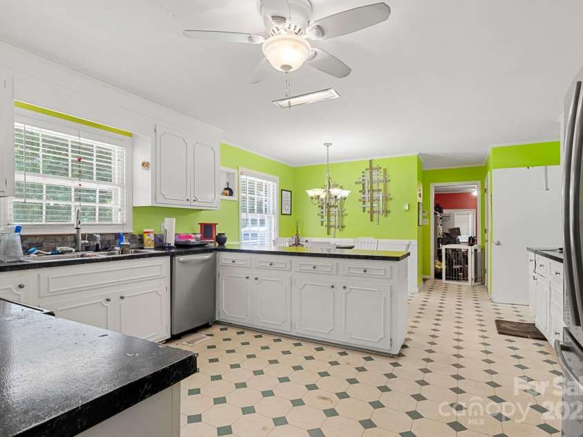 1210 Brookwood Drive, Shelby, NC 28150.  MLS# CAR4229216, YatesRealty ID 21944. The large kitchen has stainless steel appliances including...