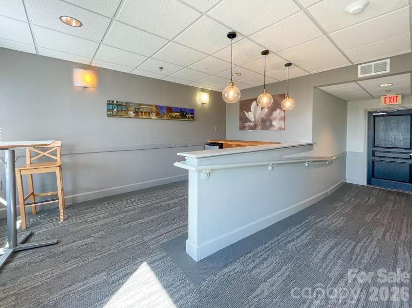 1315 East Boulevard, Charlotte, NC 28203.  MLS# CAR4387857, YatesRealty ID 2195. Common area access to rooftop terrace with mini-fridge