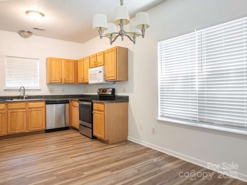 6212 Derryfield Drive, Charlotte, NC 28213.  MLS# CAR4252797, YatesRealty ID 21950. Dining area & kitchen