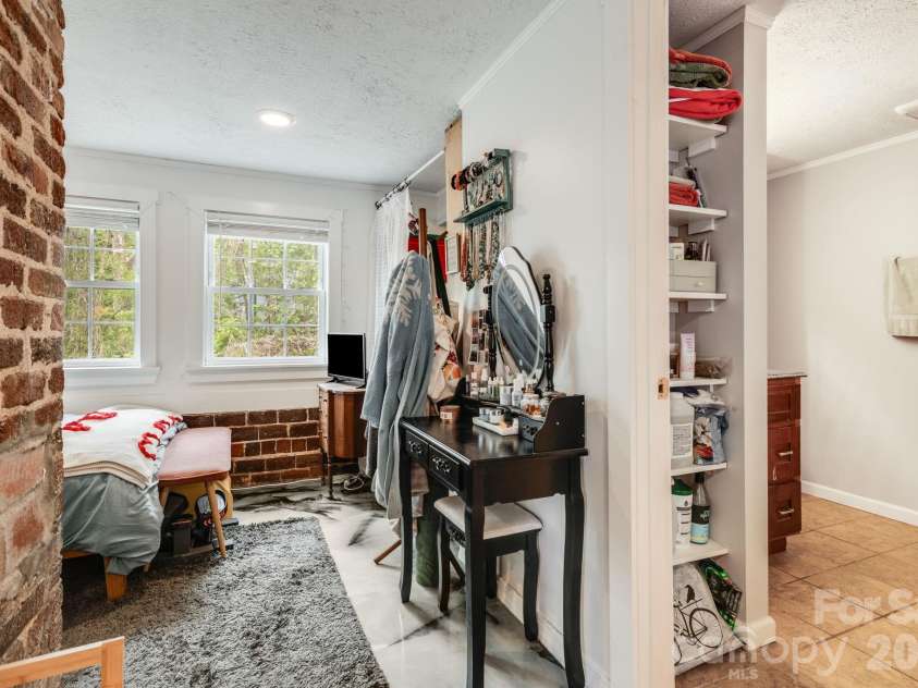 107 Courtland Avenue, Asheville, NC 28801.  MLS# CAR4376607, YatesRealty ID 21952. Lower unit bedroom 