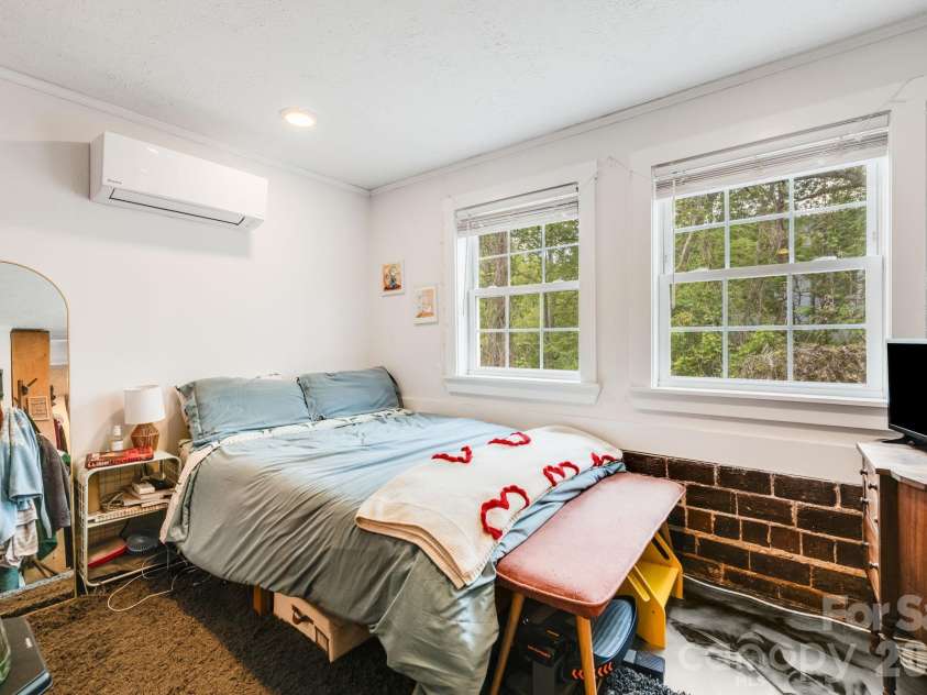 107 Courtland Avenue, Asheville, NC 28801.  MLS# CAR4376607, YatesRealty ID 21952. Lower unit bedroom 