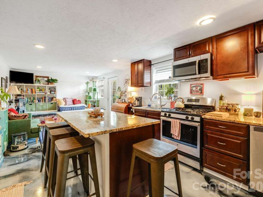 107 Courtland Avenue, Asheville, NC 28801.  MLS# CAR4376607, YatesRealty ID 21952. Lower unit kitchen 