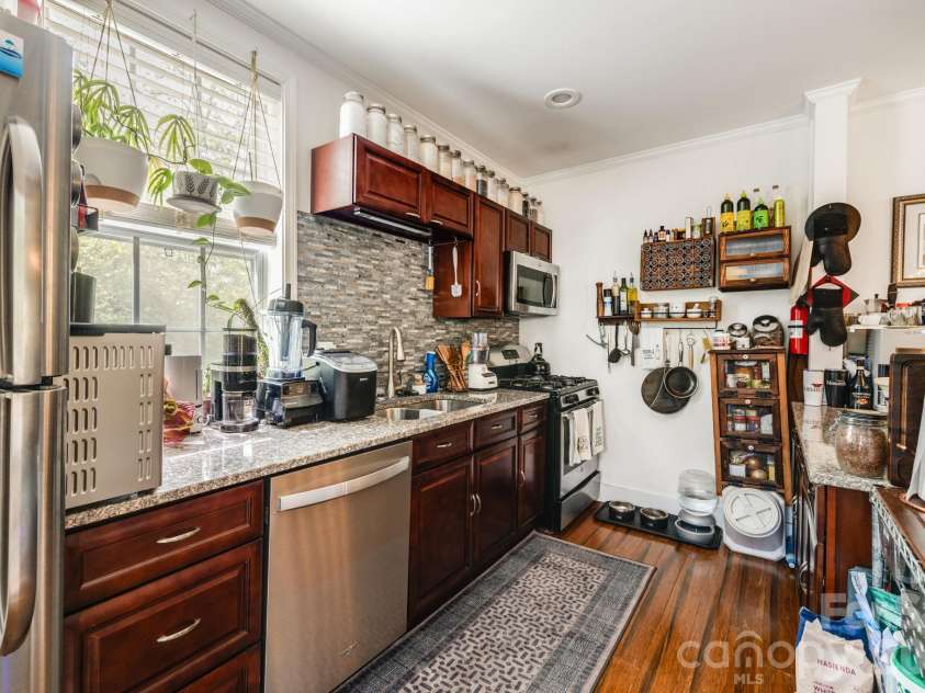 107 Courtland Avenue, Asheville, NC 28801.  MLS# CAR4376607, YatesRealty ID 21952. Middle unit kitchen