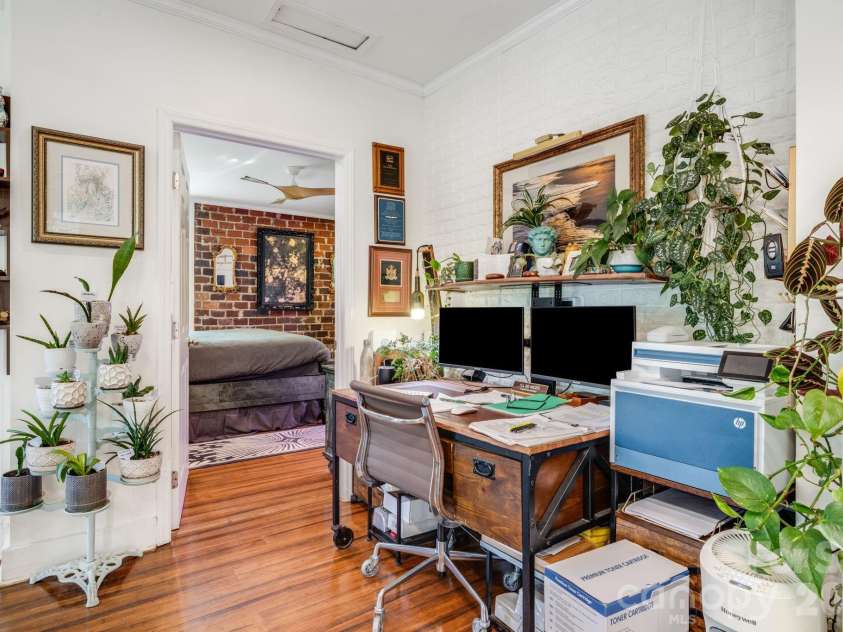 107 Courtland Avenue, Asheville, NC 28801.  MLS# CAR4376607, YatesRealty ID 21952. Middle unit office area