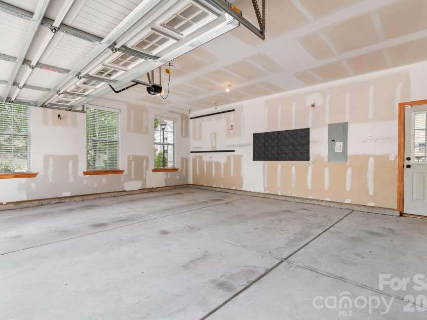 15403 Oleander Drive, Charlotte, NC 28278.  MLS# CAR4369948, YatesRealty ID 21953. Oversized 2-Car Garage w/ Service Door