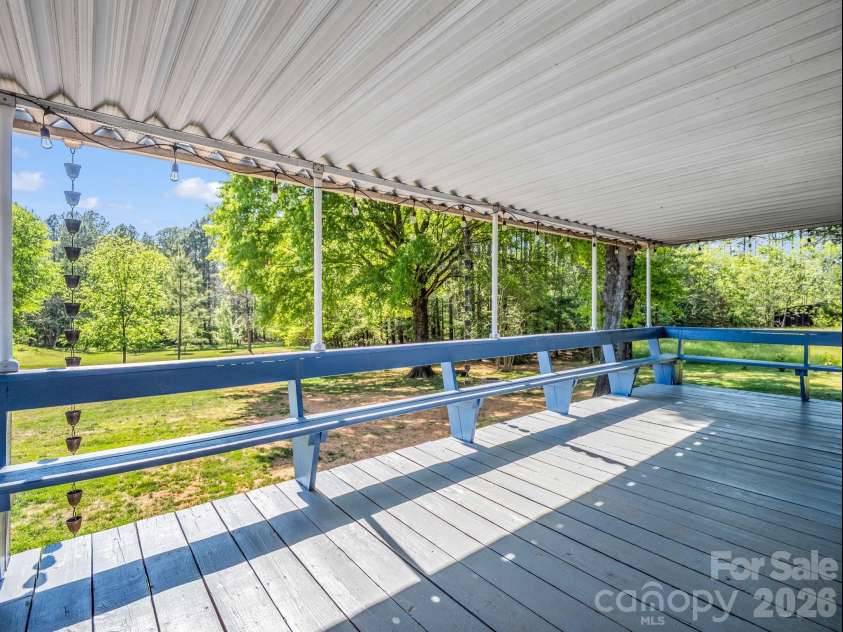 2521 Cat Square Road, Vale, NC 28168.  MLS# CAR4367429, YatesRealty ID 21955. Covered back deck