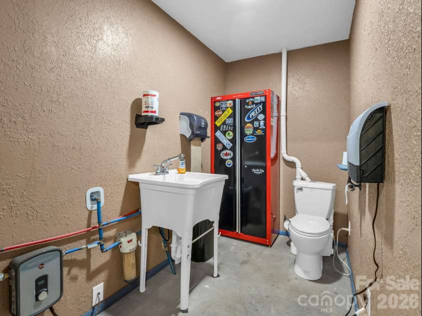 2521 Cat Square Road, Vale, NC 28168.  MLS# CAR4367429, YatesRealty ID 21955. Half bath in building on right end