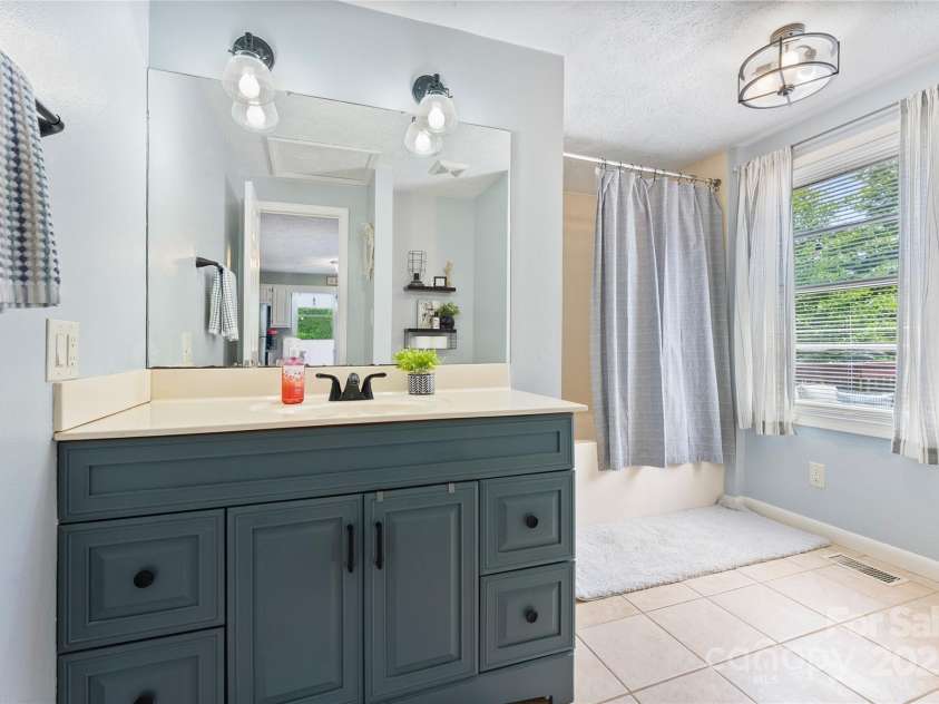 63 McDonald Road, Arden, NC 28704.  MLS# CAR4267669, YatesRealty ID 21957. 