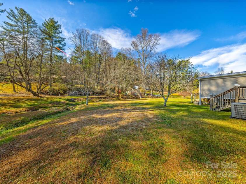 422 Battle Creek Road, Horse Shoe, NC 28742.  MLS# CAR4322878, YatesRealty ID 2196. 