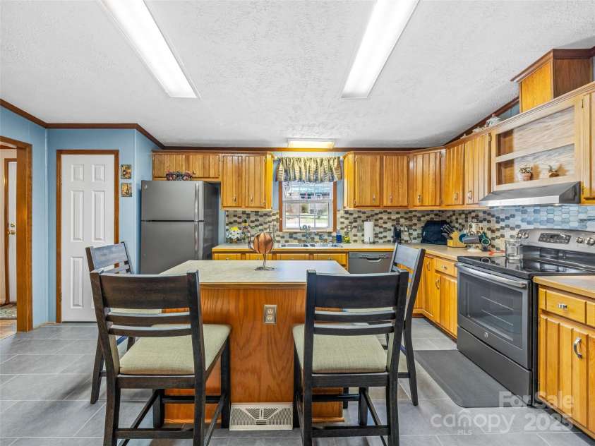 422 Battle Creek Road, Horse Shoe, NC 28742.  MLS# CAR4322878, YatesRealty ID 2196. 