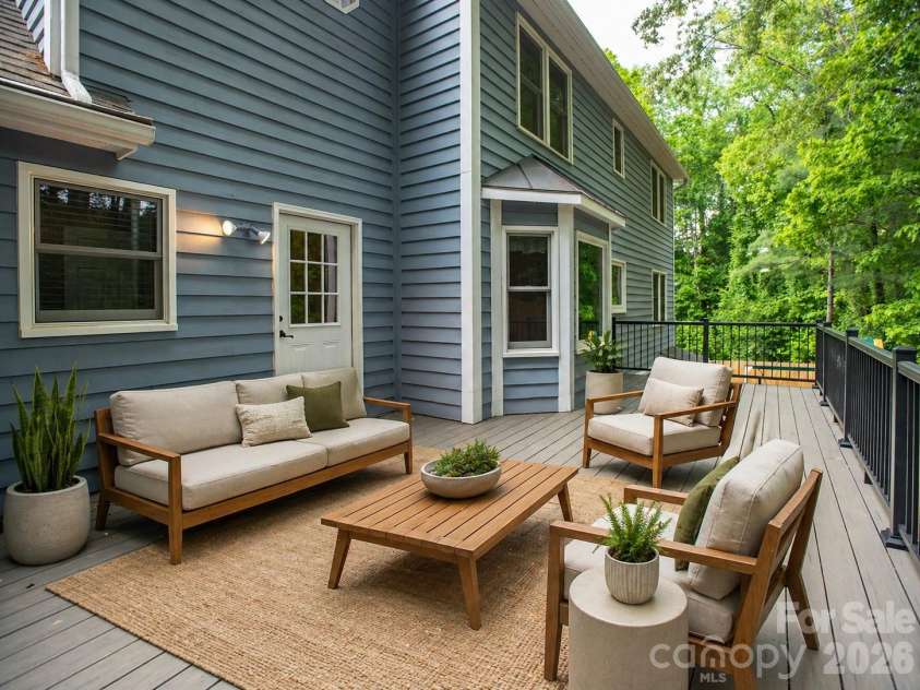 1002 Windsor Drive, Asheville, NC 28803.  MLS# CAR4361534, YatesRealty ID 21960. Large back deck virtually staged