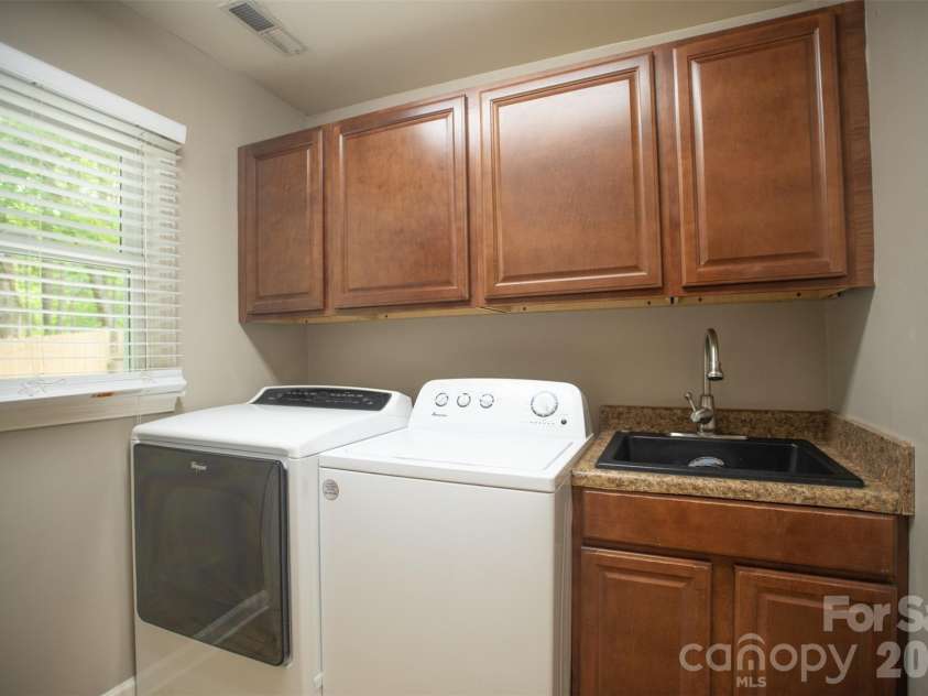 1002 Windsor Drive, Asheville, NC 28803.  MLS# CAR4361534, YatesRealty ID 21960. Laundry