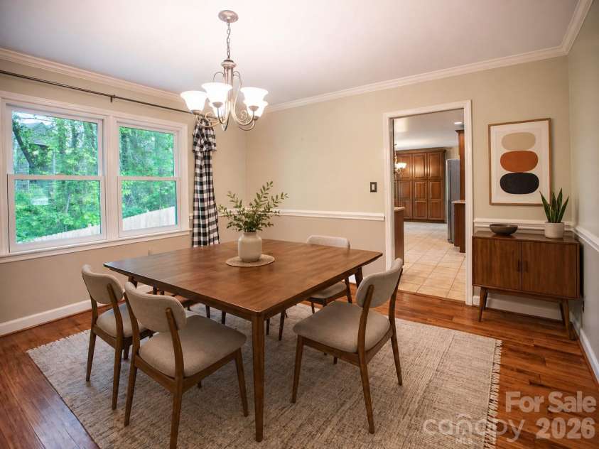 1002 Windsor Drive, Asheville, NC 28803.  MLS# CAR4361534, YatesRealty ID 21960. Virtually staged dining room