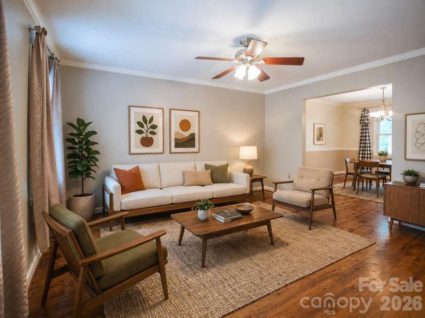 1002 Windsor Drive, Asheville, NC 28803.  MLS# CAR4361534, YatesRealty ID 21960. Virtually staged living room