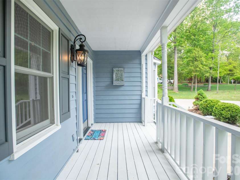 1002 Windsor Drive, Asheville, NC 28803.  MLS# CAR4413516, YatesRealty ID 21960. Front covered porch