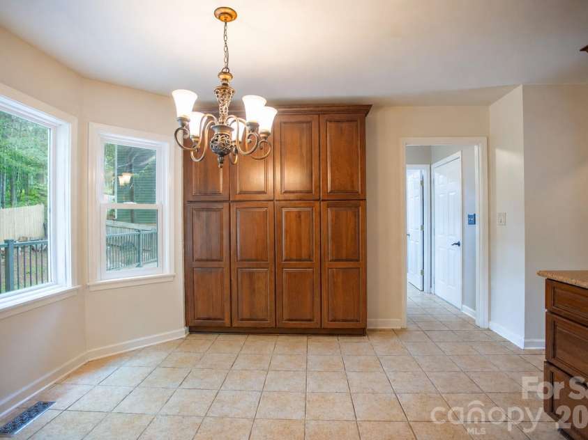 1002 Windsor Drive, Asheville, NC 28803.  MLS# CAR4413516, YatesRealty ID 21960. Kitchen with pantry