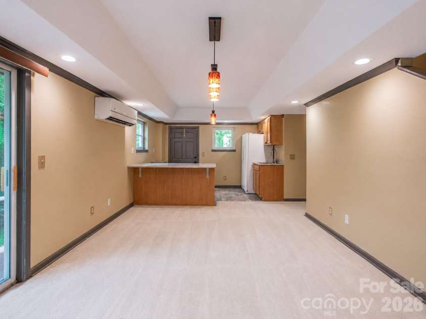 1002 Windsor Drive, Asheville, NC 28803.  MLS# CAR4413516, YatesRealty ID 21960. Lower level