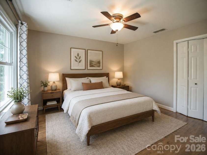 1002 Windsor Drive, Asheville, NC 28803.  MLS# CAR4413516, YatesRealty ID 21960. Staged bedroom