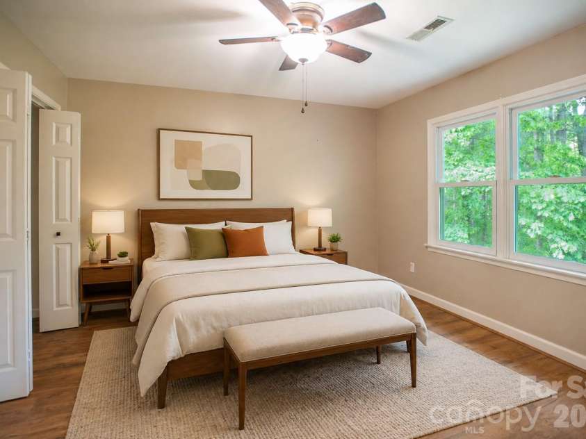 1002 Windsor Drive, Asheville, NC 28803.  MLS# CAR4413516, YatesRealty ID 21960. Staged bedroom