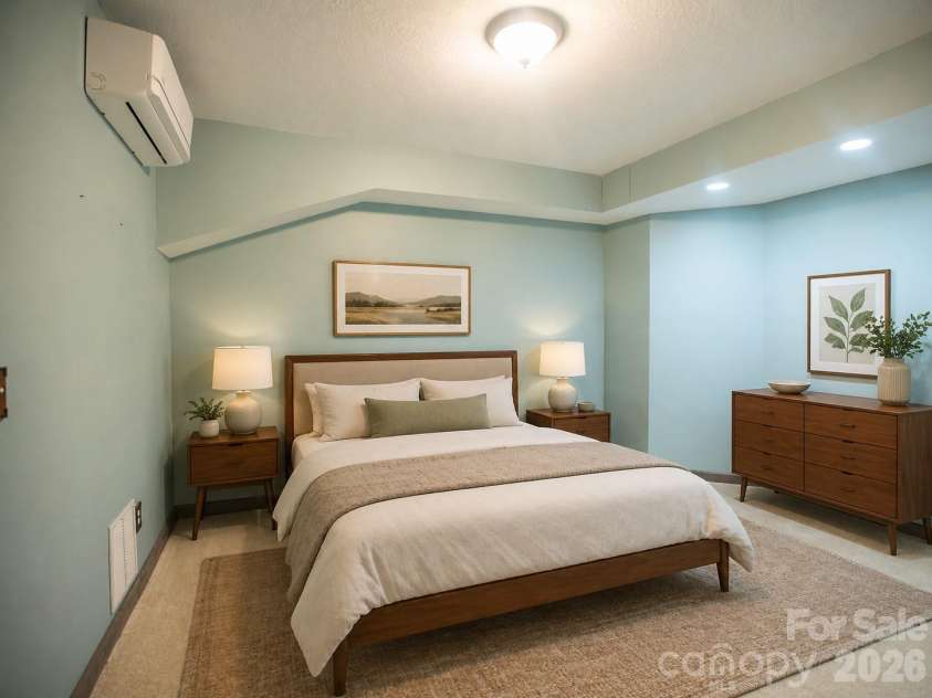1002 Windsor Drive, Asheville, NC 28803.  MLS# CAR4413516, YatesRealty ID 21960. Staged lower level bonus room/bedroom