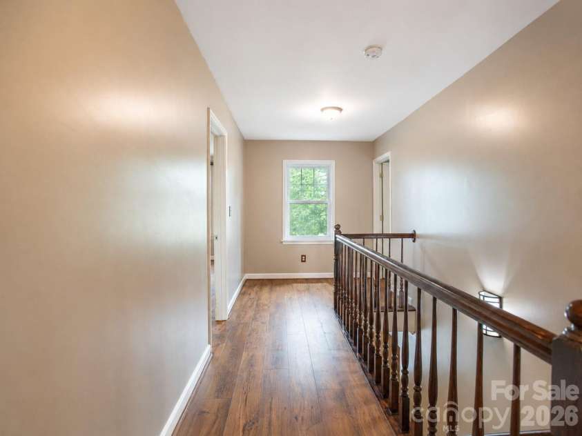 1002 Windsor Drive, Asheville, NC 28803.  MLS# CAR4413516, YatesRealty ID 21960. Upper level hallway