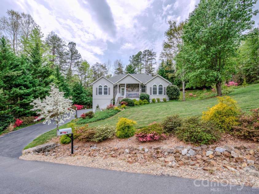 9 Double Eagle Drive, Weaverville, NC 28787.  MLS# CAR4367152, YatesRealty ID 21962. Beautifully landscaped yard