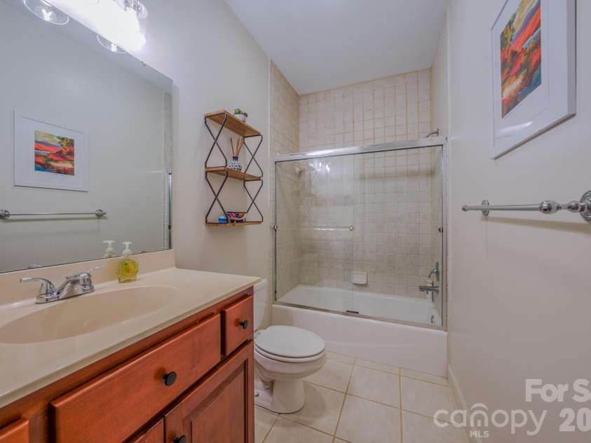 9 Double Eagle Drive, Weaverville, NC 28787.  MLS# CAR4367152, YatesRealty ID 21962. Full bath downstairs