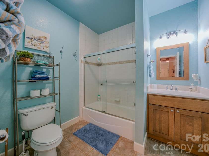 9 Double Eagle Drive, Weaverville, NC 28787.  MLS# CAR4367152, YatesRealty ID 21962. Guest bathroom