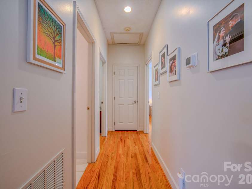 9 Double Eagle Drive, Weaverville, NC 28787.  MLS# CAR4367152, YatesRealty ID 21962. Hallway to bedrooms