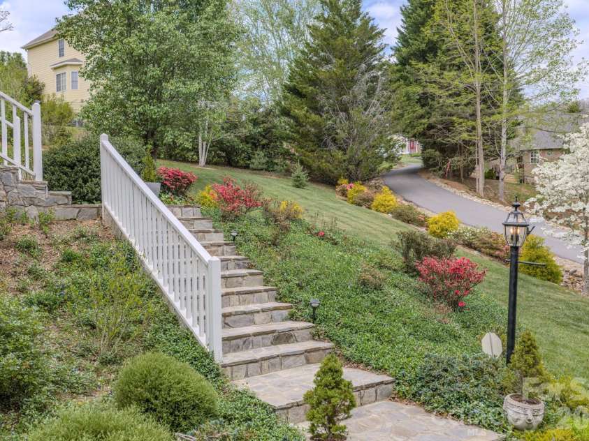 9 Double Eagle Drive, Weaverville, NC 28787.  MLS# CAR4367152, YatesRealty ID 21962. Walkway to the front door