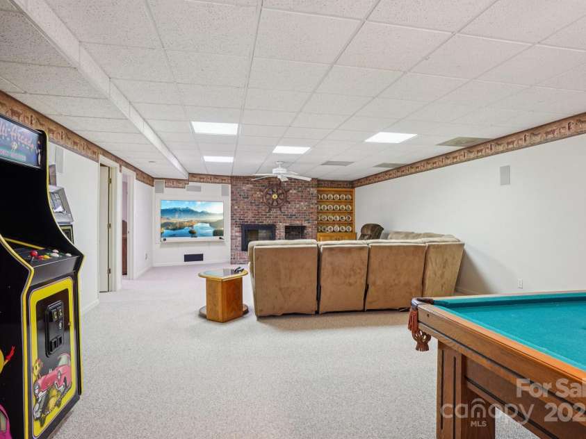 3381 Elaine Avenue, Lincolnton, NC 28092.  MLS# CAR4274962, YatesRealty ID 21964. Lower level living room