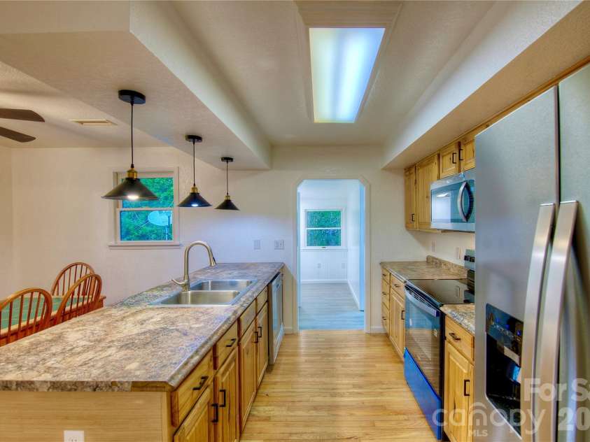 5381 State HWY 197 S Highway, Burnsville, NC 28714.  MLS# CAR4248281, YatesRealty ID 21977. 