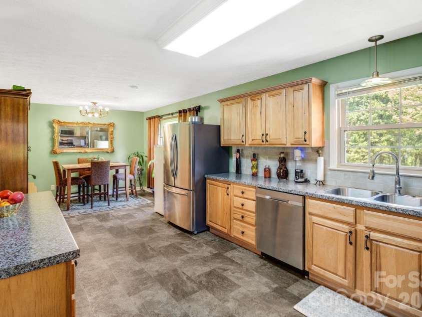 458 Beach Drive, Hendersonville, NC 28792.  MLS# CAR4379104, YatesRealty ID 21984. 