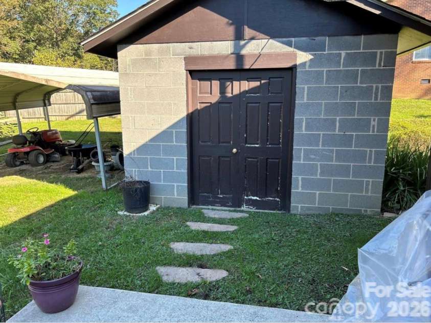 458 Beach Drive, Hendersonville, NC 28792.  MLS# CAR4379104, YatesRealty ID 21984. 