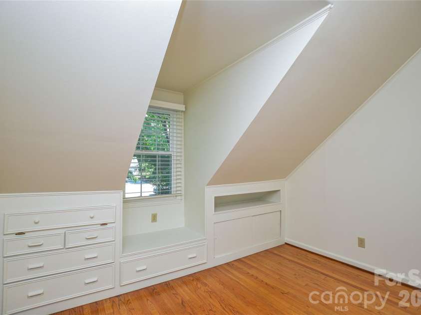 2922 Butter Churn Lane, Matthews, NC 28105.  MLS# CAR4361303, YatesRealty ID 21985. 5th bedroom has some built ins 