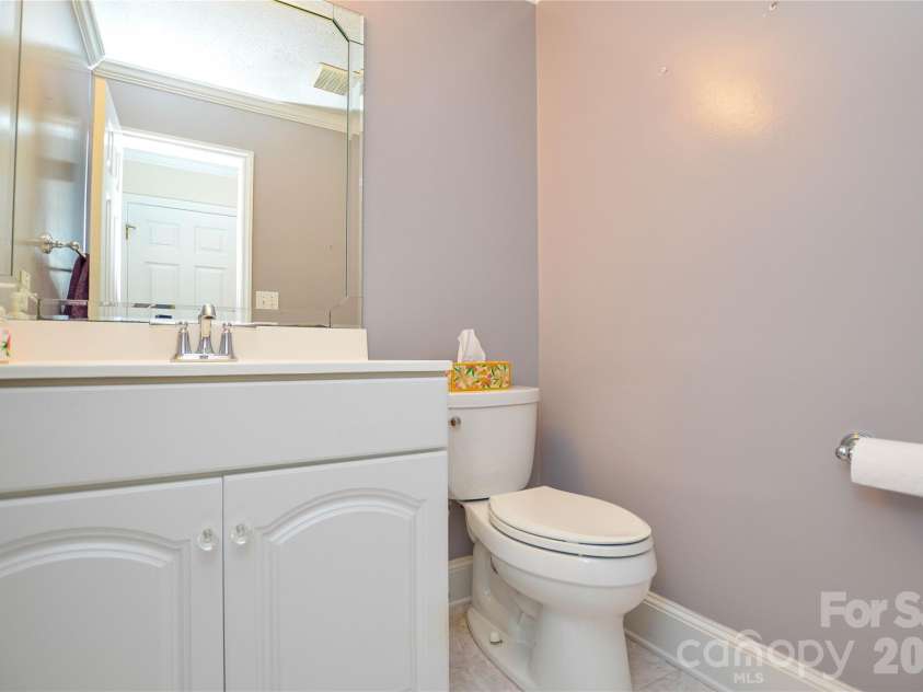 2922 Butter Churn Lane, Matthews, NC 28105.  MLS# CAR4361303, YatesRealty ID 21985. Half bath on first floor 